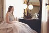 Bride in front of the mirror