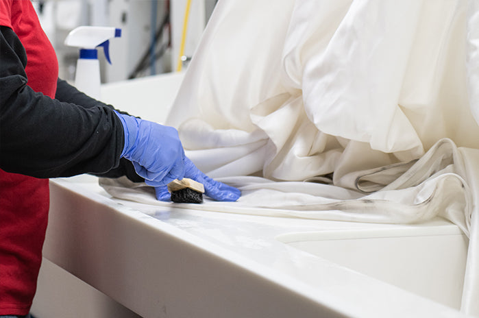 How do we clean your wedding gown?